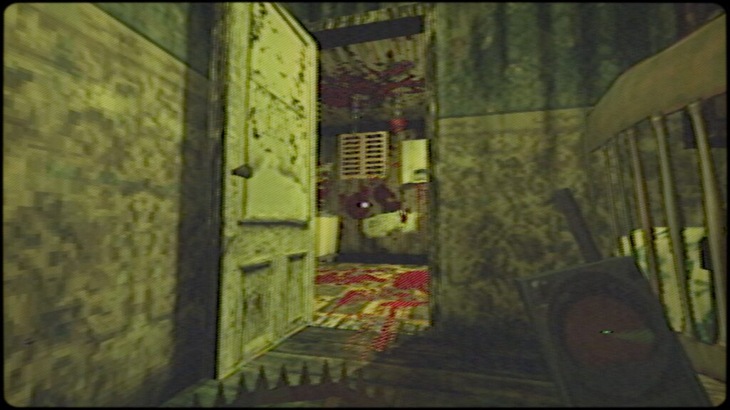 The player looks into a kitchen with blood splattered on the floor