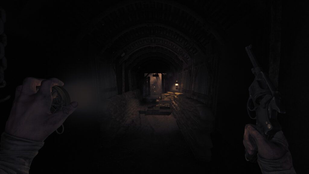 A dark hallway leads an illinated blocked doorway
