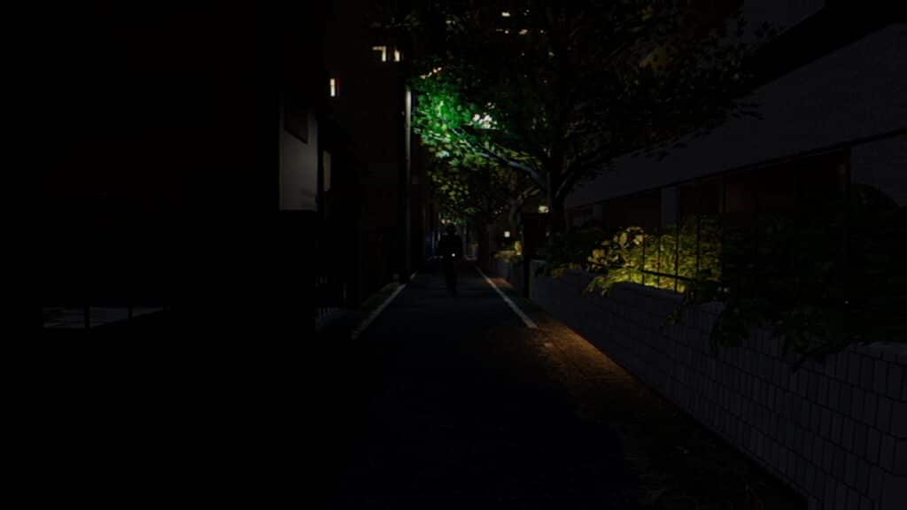 A dark figure stands down an alley at nighttime. 