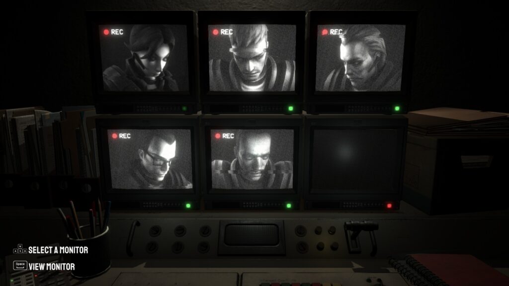A row of black and white camera monitors have faces on them.